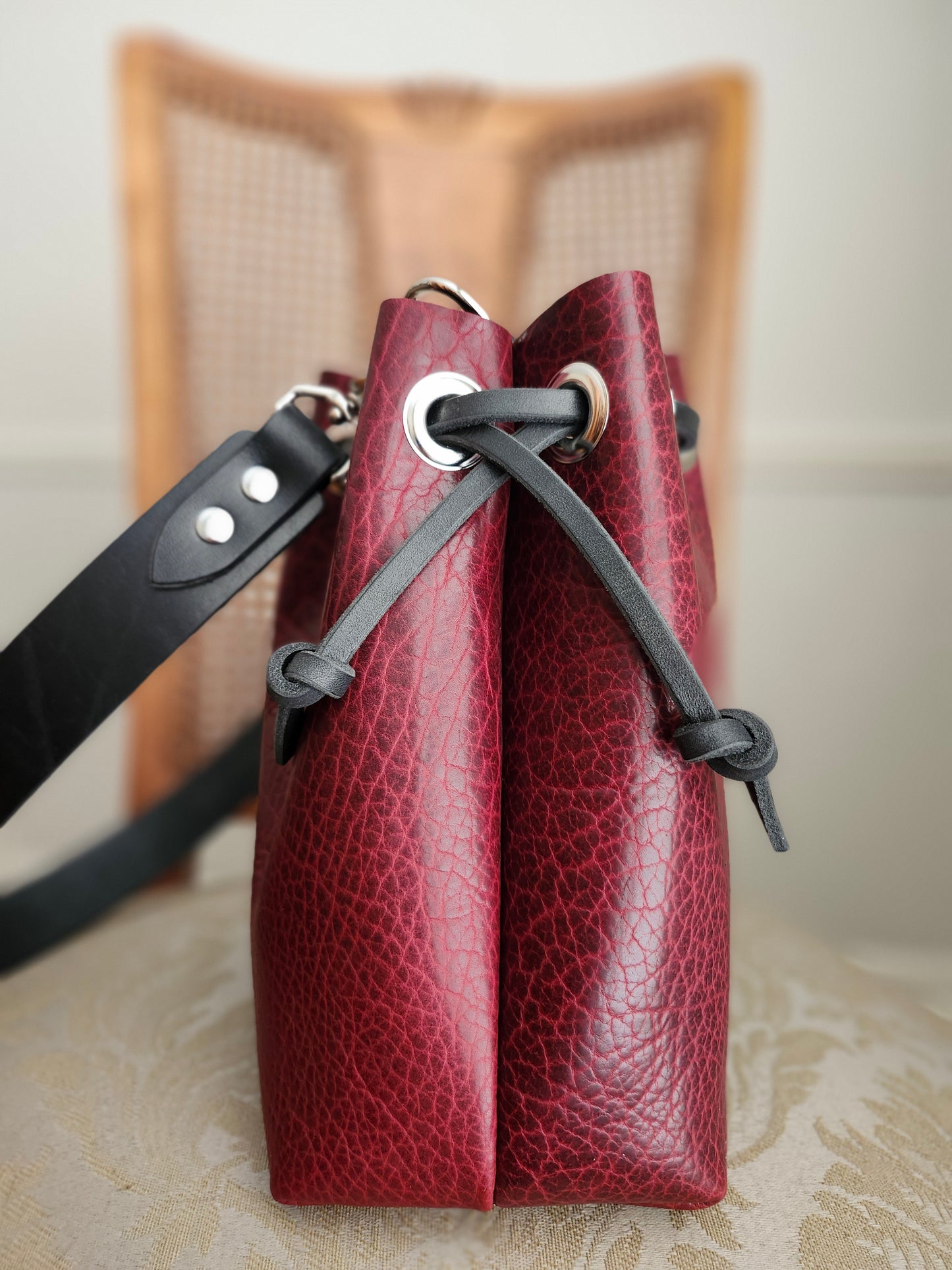 Susan Drawstring Bucket - Bison Black Cherry with Black Strap